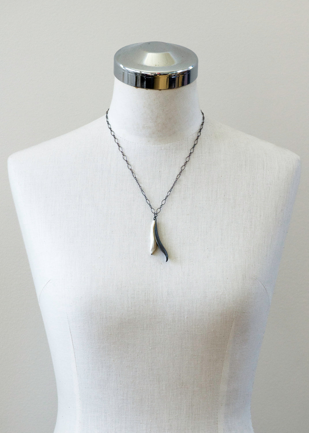 Long pearl drop necklace