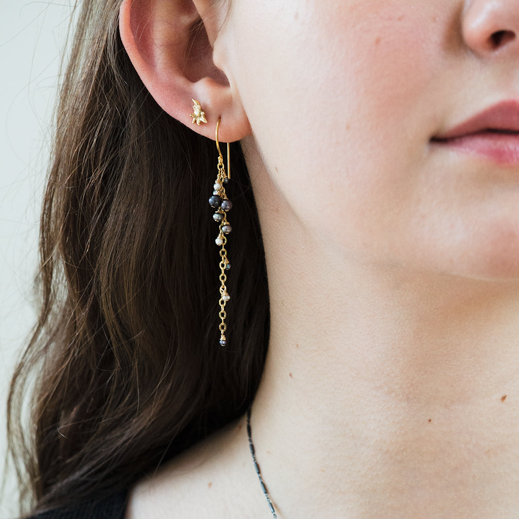 Gold and black long pearl dangle earrings