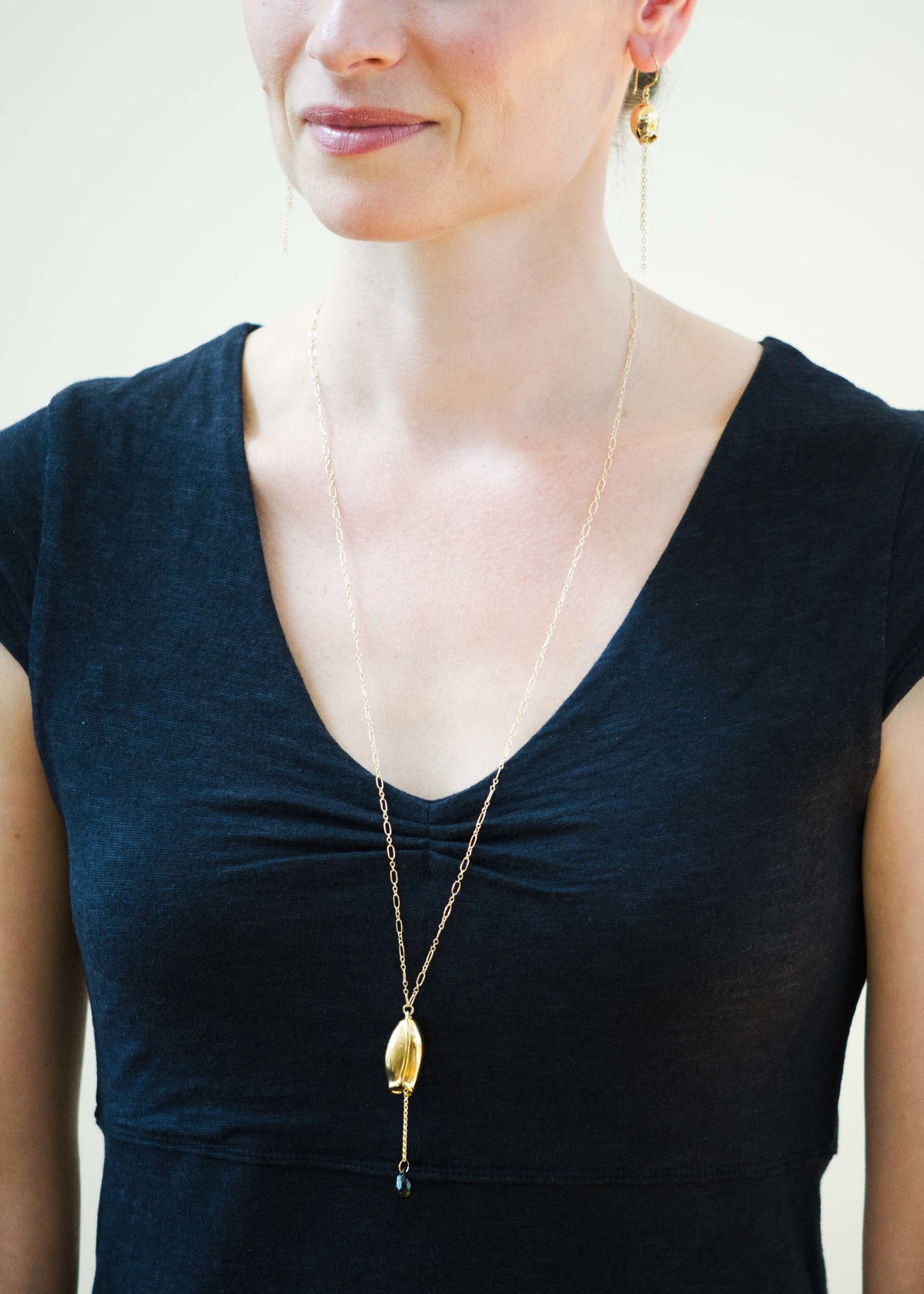 Long pod and black onyx necklace