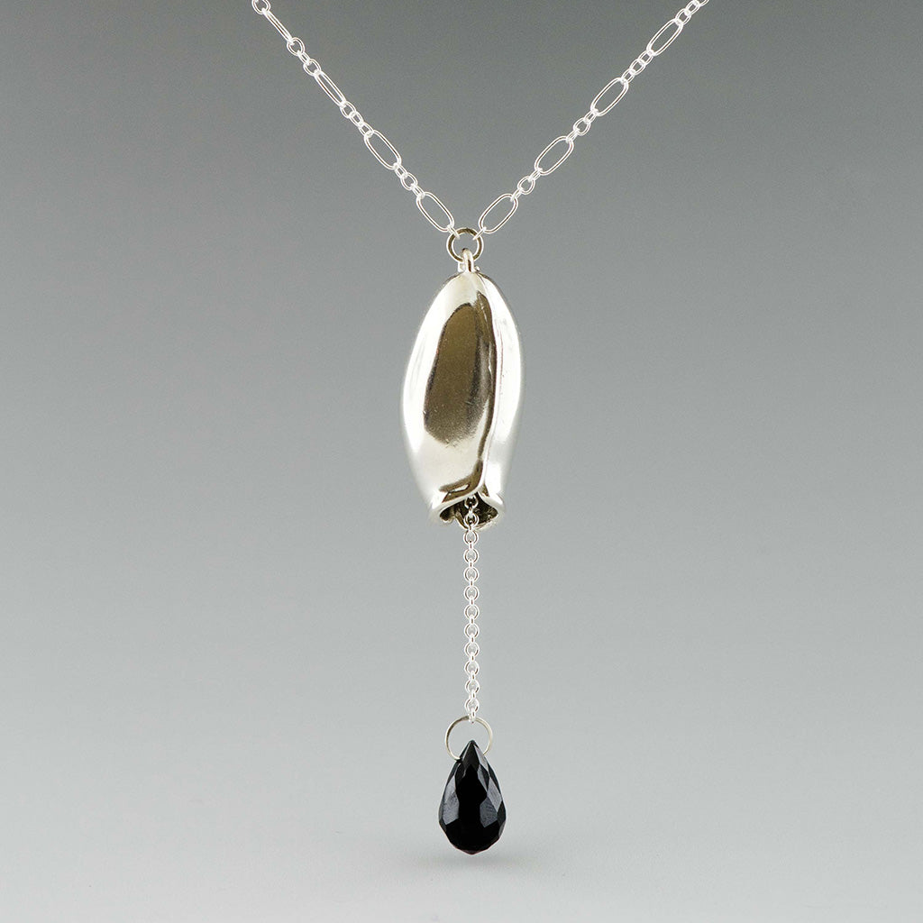 Long pod and black onyx necklace