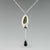 Long pod and black onyx necklace