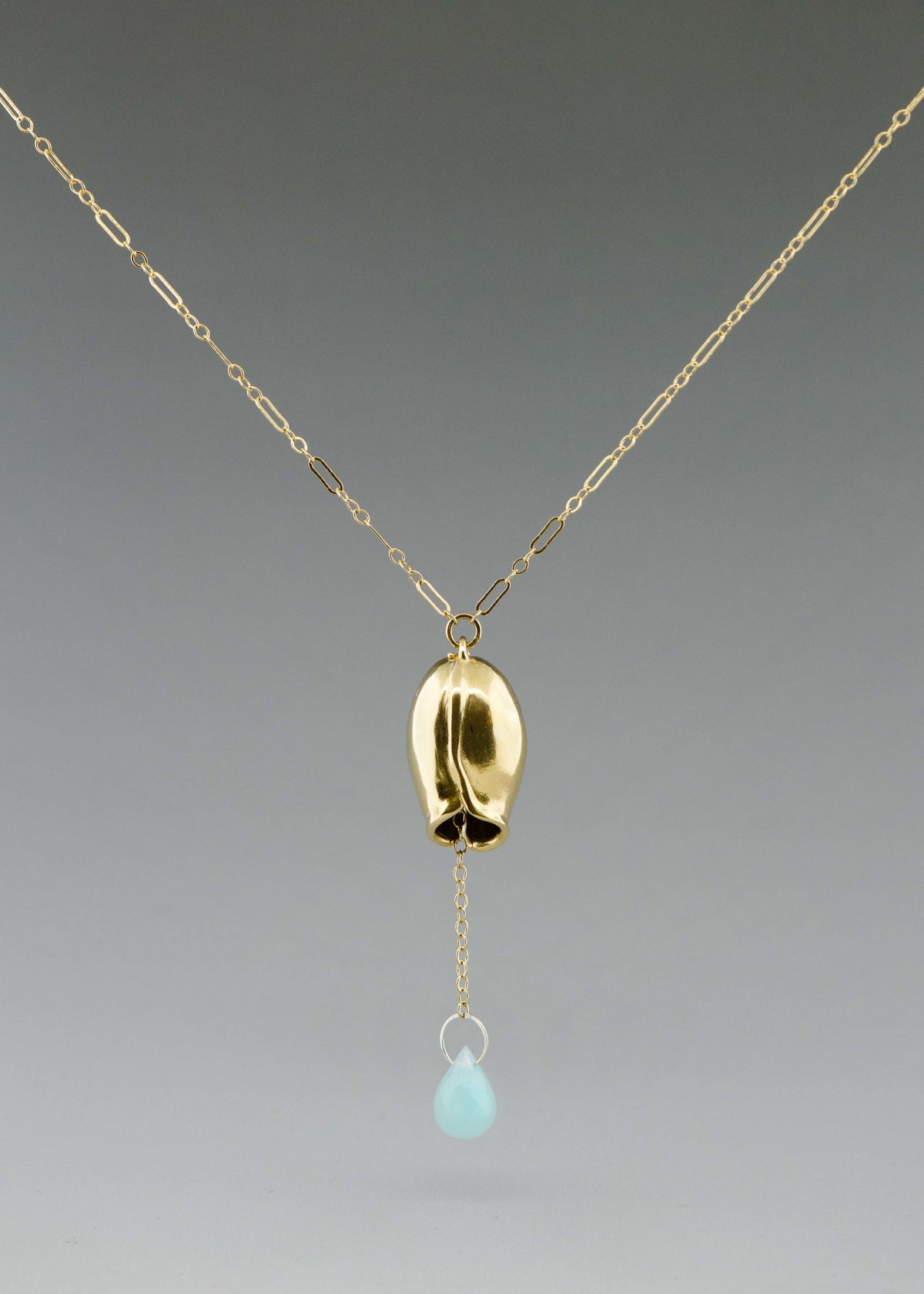 Classic pod and gemstone necklace