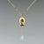 Classic pod and gemstone necklace